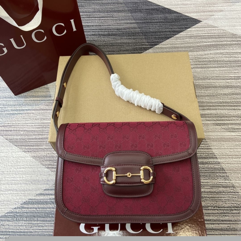 G*u*i top handle bags